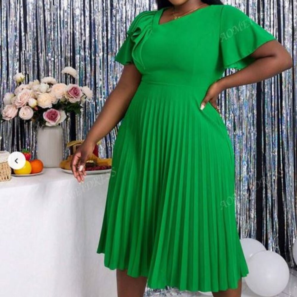Green, new with tags, pleated dress